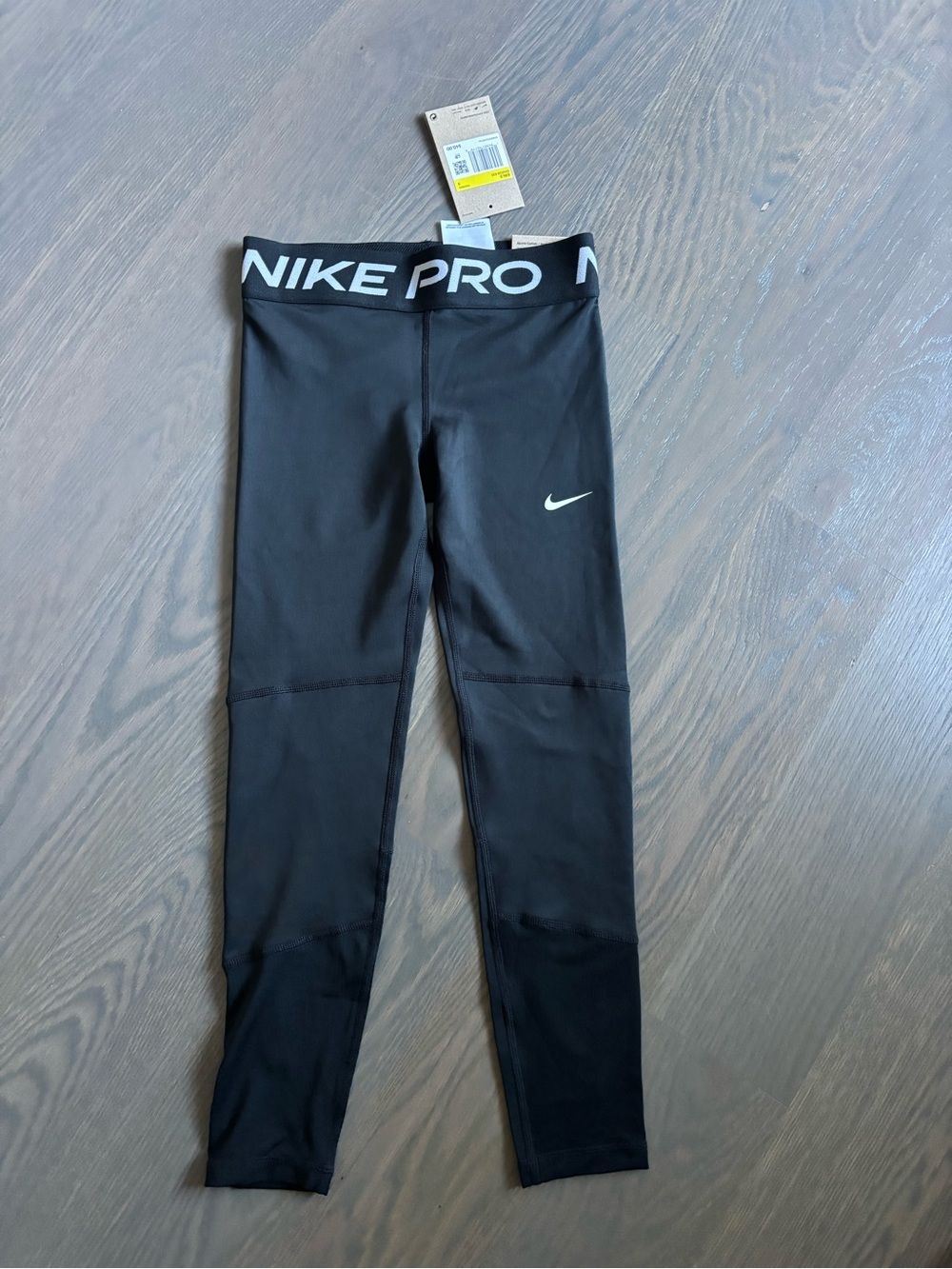 Nike Pro Kids Black Leggings with White Swoosh